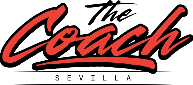 Logo The Coach Sevilla - Patrocinador de Empathy Sierra Nevada
